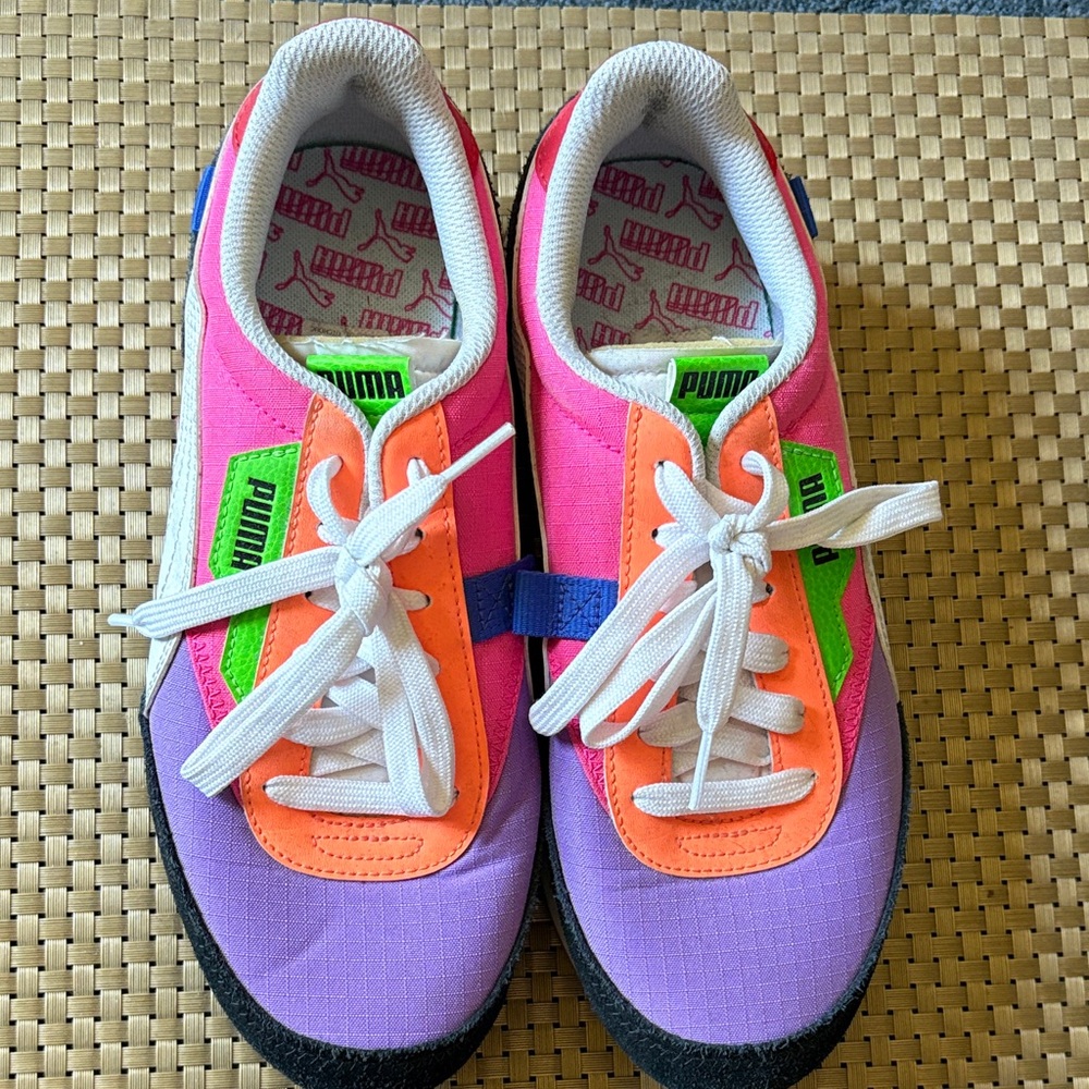 Womens neon Puma sneakers in Pink, Orange, and Purple